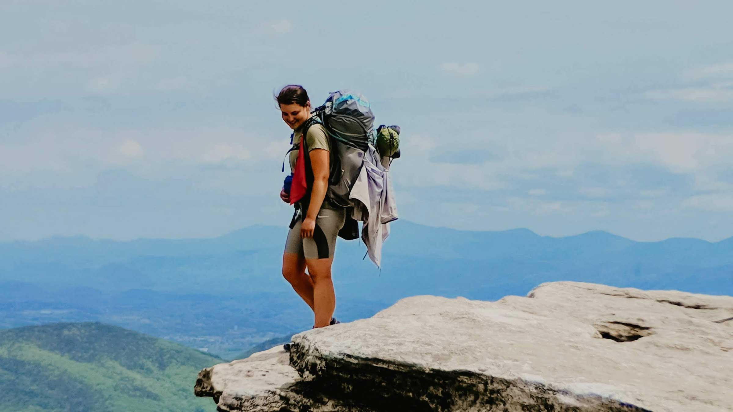 Rachel with her backpacking pack on the Appalachian Trail